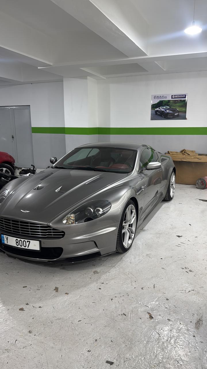Silver Aston Martin in the body shop