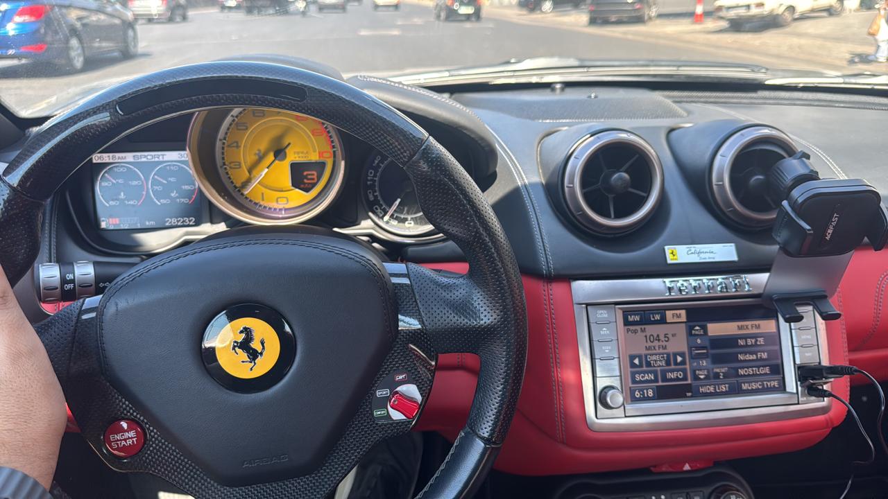 Ferrari steering wheel and red interior